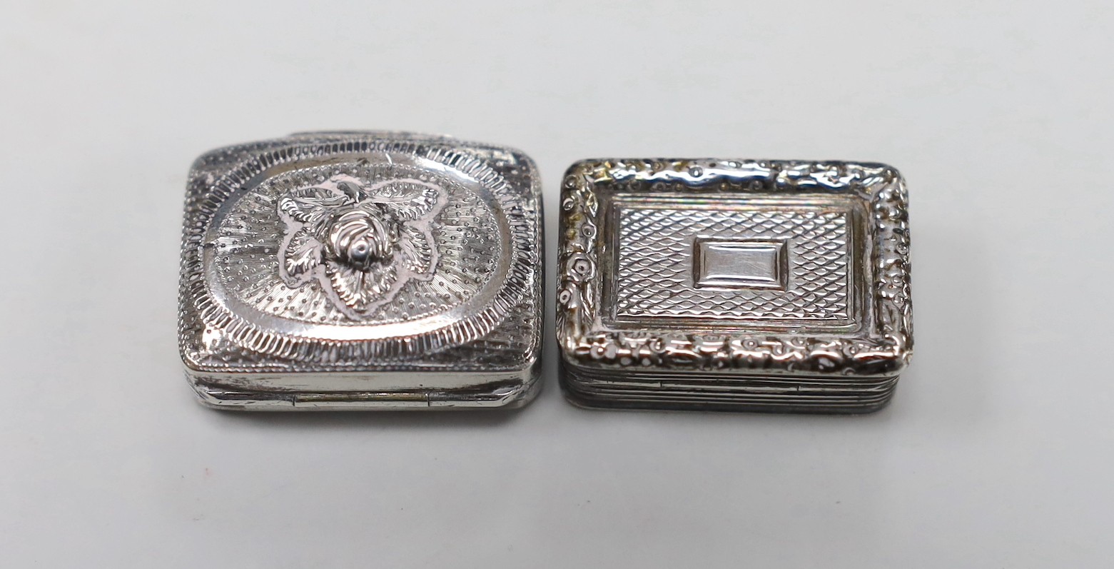 A George IV silver rectangular vinaigrette, John Shaw, Birmingham, 1826 (a.f.) and an earlier silver vinaigrette with acorn decorated cover, Birmingham, 1817.
